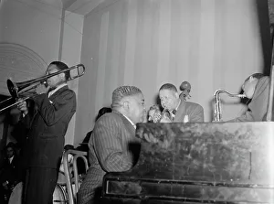 Portrait of Jay Higginbotham, Pete Johnson, Henry Allen, and Lester Young... Washington, D.C. c1940 Creator: William Paul Gottlieb
