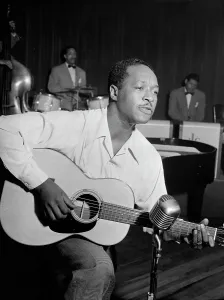 Portrait of Josh White, Café Society (Downtown), New York, N.Y. ca. June 1946. Creator: William Paul Gottlieb