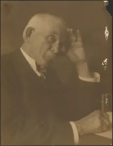 Toned Gelatin Silver Print Prints: Portrait of a Man Seated at Desk, 1907-1943. Creator: Louis Fleckenstein