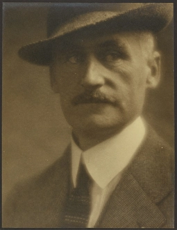Toned Gelatin Silver Print Prints: Portrait of a Man with Straw Hat, 1907-1943. Creator: Louis Fleckenstein