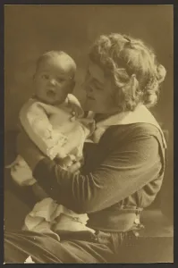 Maternal Prints: Portrait of Mother Smiling at Child, 1907-1924. Creator: Louis Fleckenstein