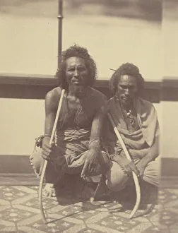 Théodule Devéria Prints: Portrait of Two Native Men Sitting on a Boat Holding Long Curved Sticks