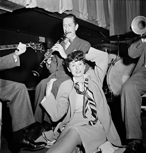 Portrait of Pee Wee Russell and Linda Keene, Eddie Condon's, New York, N.Y. 1946. Creator: William Paul Gottlieb