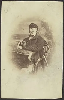 Hamper Prints: Portrait of a Seated Man with Basket, late 19th century. Creator: Unknown