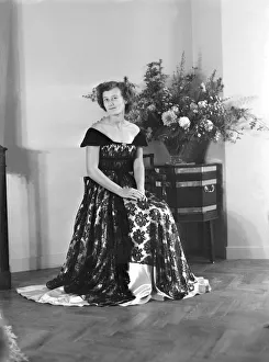 Portrait of seated woman in evening dress, (Isle of Wight?), c1935