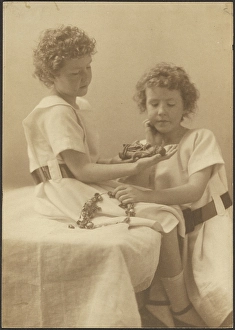 Wreath Prints: Portrait of Two Sisters Holding Statue and Wreath, 1907-1943. Creator: Louis Fleckenstein