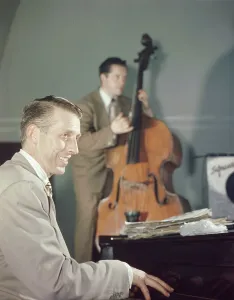 Stanley Newcomb Kenton Prints: Portrait of Stan Kenton and Eddie Safranski, 1947 or 1948. Creator: William Paul Gottlieb