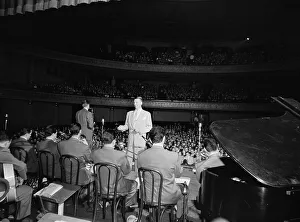 Stanley Newcomb Kenton Prints: Portrait of Stan Kenton and Laurindo Almeida, 1947 or 1948. Creator: William Paul Gottlieb