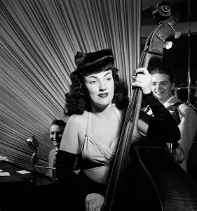 Portrait of Teddy Kaye, Vivien Garry, and Arv(in) Charles Garrison, Dixon's, N.Y. ca. May 1947. Creator: William Paul Gottlieb