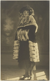 Muff Prints: Portrait of a Woman in Fur Coat with Muff, 1907-1943. Creator: Louis Fleckenstein