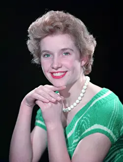 Wool Prints: Portrait of a woman with green eyes, c1955. Creator: Arthur Charles Kirby Ware