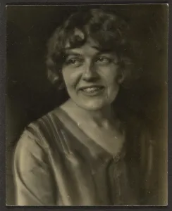 Satin Prints: Portrait of a Woman in Satin Shirt, 1907-1943. Creator: Louis Fleckenstein