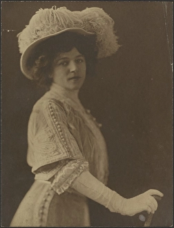 Toned Gelatin Silver Print Prints: Portrait of a Woman Standing with Umbrella, 1907-1943. Creator: Louis Fleckenstein