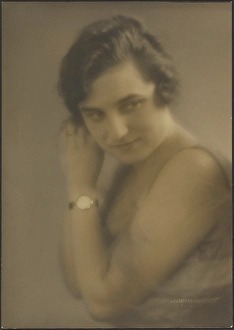 Looking Sideways Prints: Portrait of a Woman with Watch, 1907-1924. Creator: Louis Fleckenstein