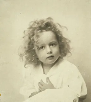 Dressing Gown Prints: Portrait of a young girl with tousled hair, c1900. Creator: Misses Selby