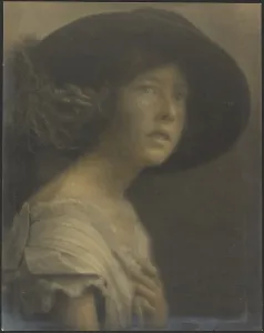 Portrait of a Young Woman with Black Hat, 1907-1943. Creator: Louis Fleckenstein