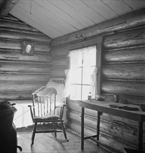 Possibly: Interior of farmers two-room log home, FSA borrower, Boundary County, Idaho, 1939. Creator: Dorothea Lange