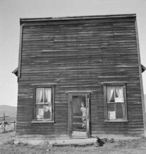 Public House Collection: Possibly: Member of Ola self help sawmill co-op lives in what was once... Gem County, Idaho, 1939