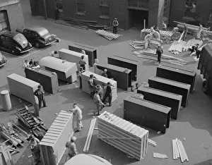 Possibly: United States government workers and carpenters making crates... Washington, D.C. 1942. Creator: Gordon Parks