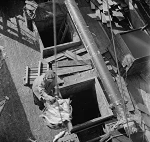 Catch Prints: Possibly: Unloading fish from the hold of a New England fishing boat