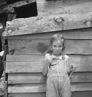 Possibly: Eight year old daughter who helps... tobacco... Granville County, North Carolina, 1939. Creator: Dorothea Lange
