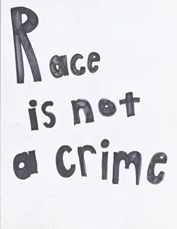 Placard Collection: Poster reading 'Race is not a crime'used at Baltimore protests, April 2015