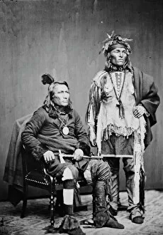 Studio Portrait Collection: Potawatomi chief and brave, between 1855 and 1865. Creator: Unknown