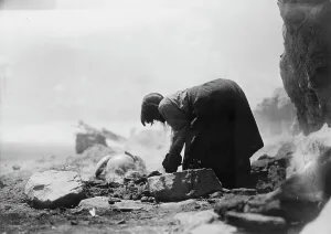 First Nations Prints: Potter building her kiln, c1906. Creator: Edward Sheriff Curtis