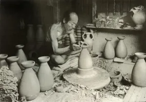 Artisan Gallery: The Potter at his Wheel, 1910. Creator: Herbert Ponting