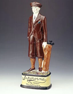 Images Dated 2nd August 2005: Pottery figure of a golfer advertising Superorna tailoring, 1920s
