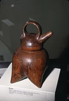 Columbia Gallery: Pottery vessel with twin spouts (one missing) and strap-handle, Quimbaya, Columbia, 500-1000