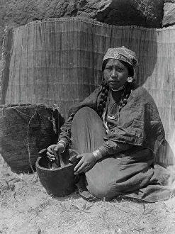 Mortar And Pestle Prints: Pounding fish-Wishram, c1910. Creator: Edward Sheriff Curtis