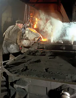 Cupola Prints: Pouring molten metal from a cupola into moulds