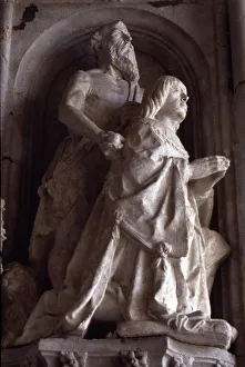 Manuel Gallery: Praying statue of Don Manuel in the facade of the Jeronimos Monastery in Lisbon