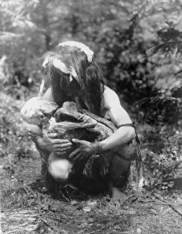 Mummy Prints: Preparing to eat the mummy, c1911. Creator: Edward Sheriff Curtis