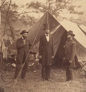 [President Abraham Lincoln, Major General John A. McClernand (right), and E. J