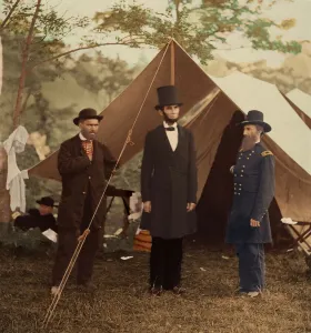 [President Abraham Lincoln, Major General John A. McClernand (right), and E. J