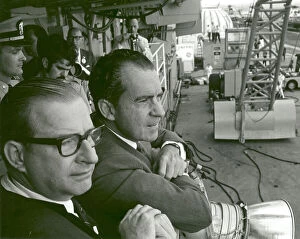 Aircraft Carrier Gallery: President Nixon and Dr. Paine Wait to Meet Apollo 11 Astronauts, 1969. Creator: NASA