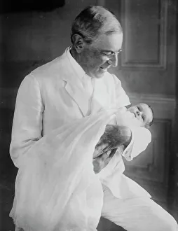 Wilson Thomas Woodrow Prints: Pres't [i.e. President] Wilson and McAdoo Baby, 1915. Creator: Bain News Service