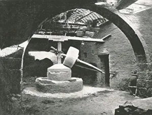 Waterlow And Sons Ltd Prints: Primitive corn-mill, Nile Delta, Egypt, 1895. Creator: Unknown