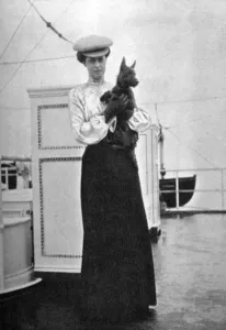 Princess Victoria (1868-1935) with Mac on board the royal yacht Victoria and Albert III, 1908. Artist: Queen Alexandra