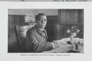 Booker T Prints: Principal Washington in his private office, Tuskegee Institute, 1923. Creator: Unknown