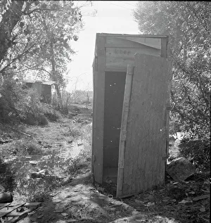 Refugee Camp Prints: Privy in cotton camp for migratory workers, California, 1936. Creator: Dorothea Lange