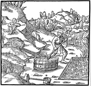 Georg Bauer Prints: Producing salt by evaporating natural brine by pouring it into a pit of burning charcoal