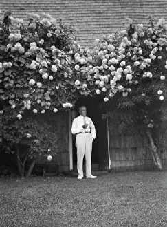 Climbing Plants Prints: Professor Robert Wood, standing outdoors, 1932. Creator: Arnold Genthe