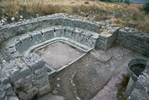 Dougga Gallery: Public latrine and washbasin near the baths in Roman Dougga, 2nd century