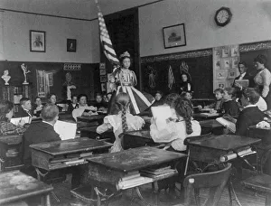 Public school students in art class sketching live model wearing stars-and...Washington DC, (1899?). Creator: Frances Benjamin Johnston