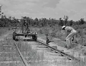 Dismantling Prints: Pulling out the railroad tracks which lead to the closed sawmill