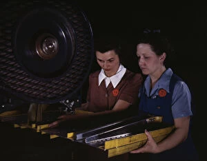 Assembly Line Gallery: Punching rivet holes in a frame member for a B-25 bomber...North American Aviation, Inc. CA, 1942