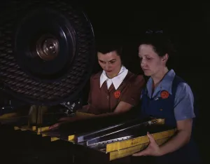 Assembly Line Gallery: Punching rivet holes in a frame member for a B-25 bomber...North American Aviation, Inc. CA, 1942